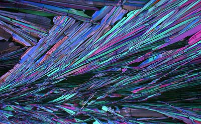 50 kb JPG microphoto of a benzoic acid crystal by Doug Craft