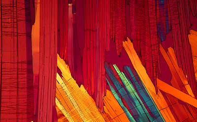 50 kb JPG microphoto of a benzoic acid crystal by Doug Craft