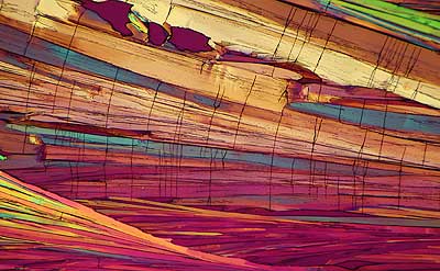 50 kb JPG microphoto of a benzoic acid crystal by Doug Craft