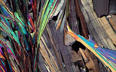 50 kb JPG microphoto of a benzoic acid crystal by Doug Craft