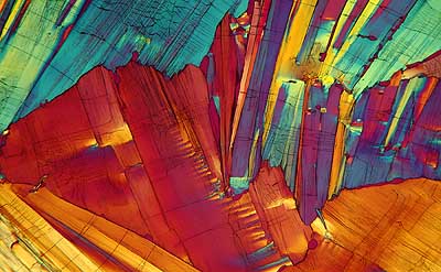 50 kb JPG microphoto of a benzoic acid crystal by Doug Craft