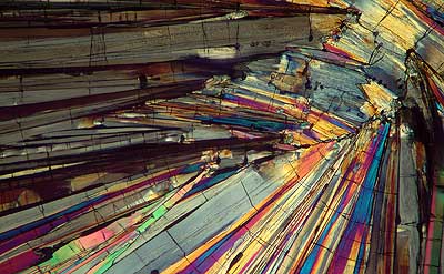 50 kb JPG microphoto of a benzoic acid crystal by Doug Craft