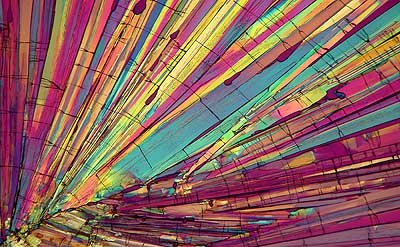 50 kb JPG microphoto of a benzoic acid crystal by Doug Craft