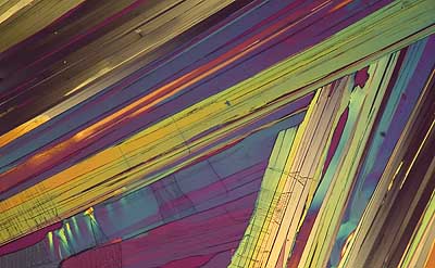 50 kb JPG microphoto of a benzoic acid crystal by Doug Craft