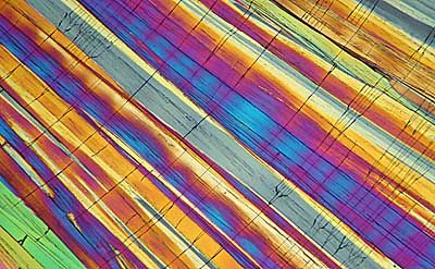 50 kb JPG microphoto of a benzoic acid crystal by Doug Craft