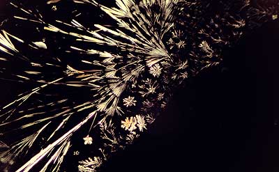 50 kb JPG microphoto of a precipitation crystal by Doug Craft