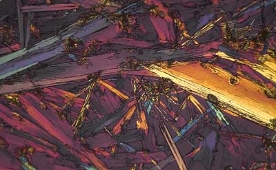 50 kb JPG microphoto of a precipitation crystal by Doug Craft