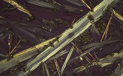 50 kb JPG microphoto of a precipitation crystal by Doug Craft